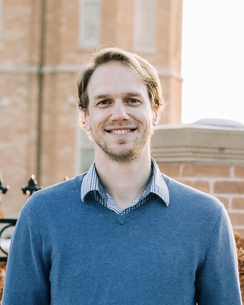 Professional headshot of the founder